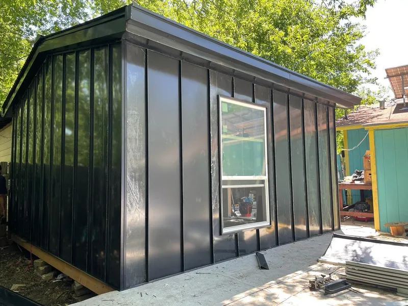 Black standing seam metal wall panels for Metal Roof Installation in Dakota Dunes