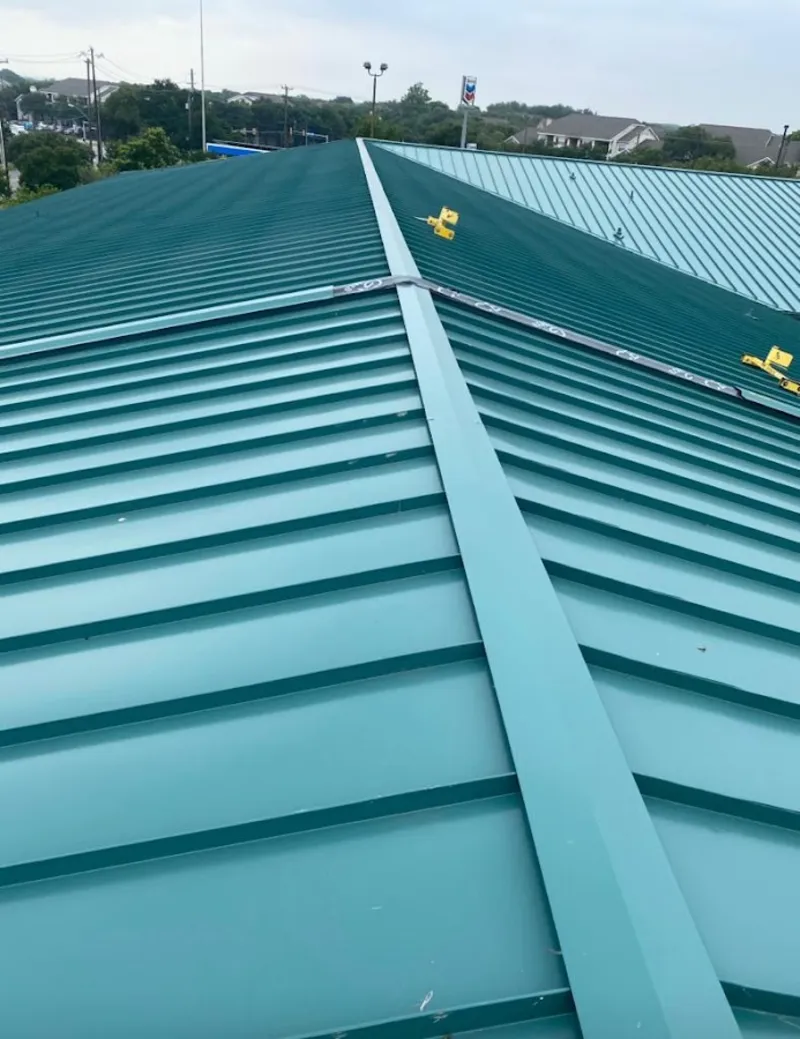Green commercial metal roof ridge and valley for Metal Roof Repair in Dakota Dunes