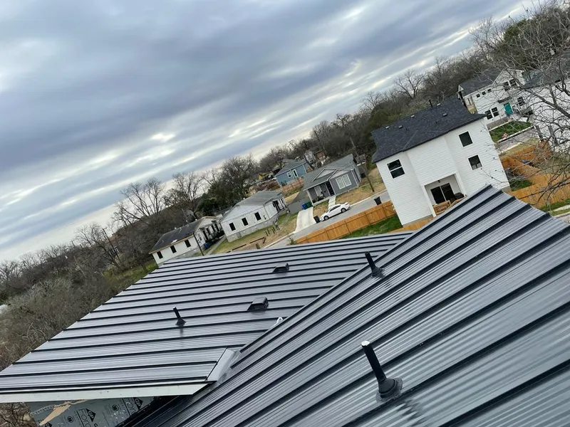 Standing seam metal roof panels with vents for Skylight Repair in Dakota Dunes